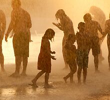 "Fountain Falls" - people soak themselves in fountain by John Hartung