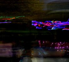 Long exposure crowd with light sabre fight by Andy Green