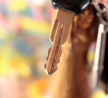 car keys and golden champagne bottle top by morrbyte