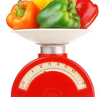 peppers on scale by Jim Hughes