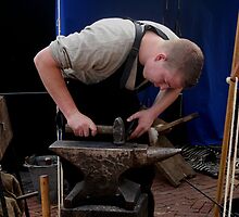 Mettle on metal: a blacksmith's apprentice by patjila