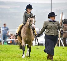 Young Rider Gets A Helping Hand by lynn carter
