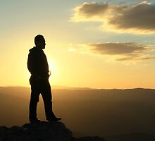 Mountaintop silhouette by Tim Coleman