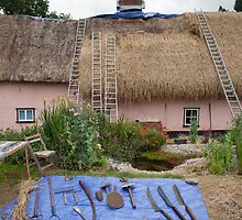 Thatching in progress by Christopher Cullen