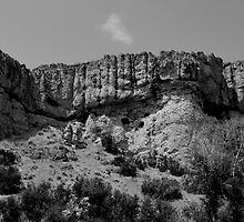 Holes in the Cliff by J. D. Adsit