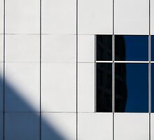 The one with a white wall a window and a shadow by David Librach - DL Photography -