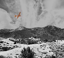 MOUNTAINS, SKY AND A YELLOW PLANE by Paul Quixote Alleyne