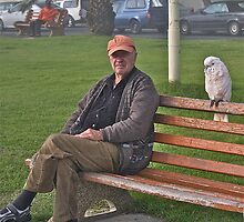 A man with his avian friend by davridan