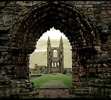 Archway leading to cemetery by Dan Treasure