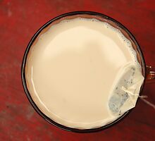 hot tea with milk by bayu harsa