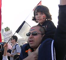 Father and Son Demonstrate Supporting Egypt by Leyla Hur