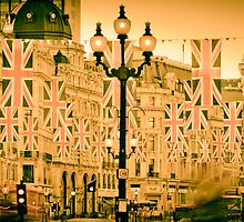 UK. London. Regent Street. Union Jack decorations for Royal Wedding. by Alan Copson