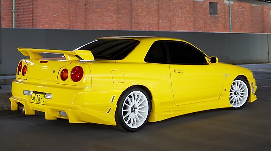 Yellow Nissan Skyline R34" 
