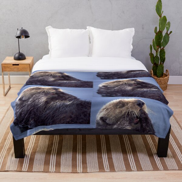A Southern Sea Otter, preening as it wakes from a nap. Throw Blanket