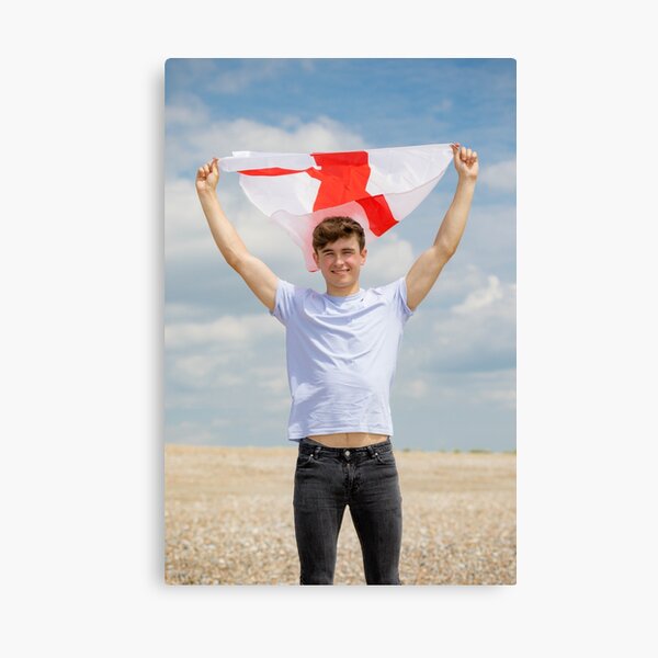 A young man with the Flag of England, the cross of St George Canvas Print