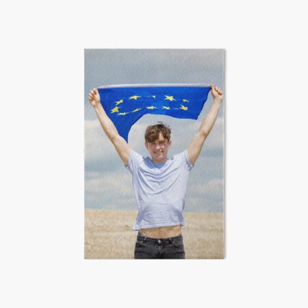 A young man holding the flag of The European Union Art Board Print