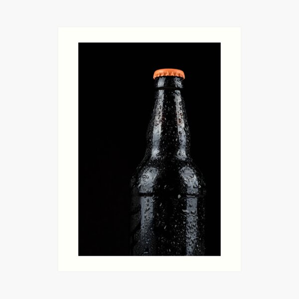 Bottle of beer with water droplets isolated on black background Art Print
