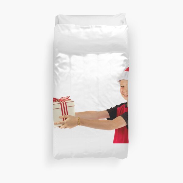Pre-teen boy with a christmas gift Duvet Cover