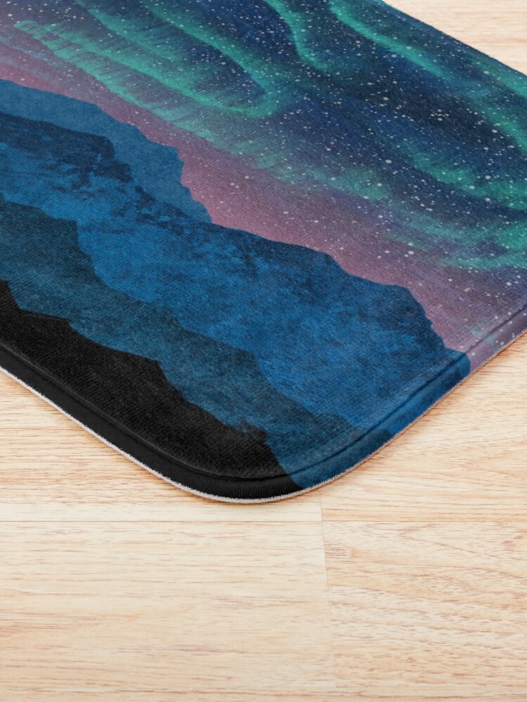 Alternate view of Aurora borealis over mountains Bath Mat
