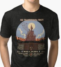 See Castlevania First! Tri-blend T-Shirt