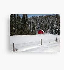 Red barn in snow Canvas Print