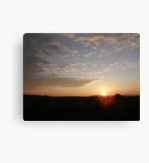 Distant Grainan sunset Canvas Print