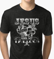 JESUS LOVES ME AND MY TATTOOS Tri-blend T-Shirt