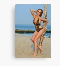 Young redhead girl on the beach standing pretty in designers swimsuit Canvas Print