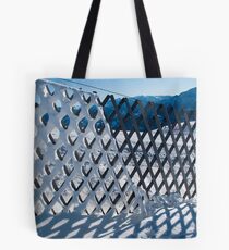 Melting snow from a fence Tote Bag