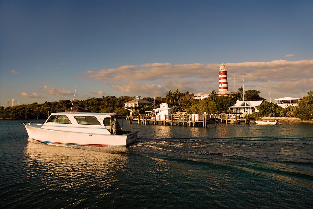 "Ferry Boat and Lighthouse, Hope Town, Abaco, Bahamas" by Shane Pinder