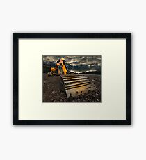 threatening and moody excavator Framed Print