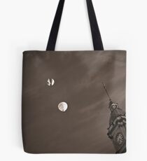 Floating above Time Tote Bag