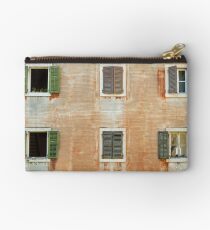 Old weathered facade. Studio Pouch