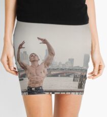Dramatic Sky with Hot Model on the Thames in London Mark in colour Mini Skirt