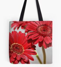 Three red Gerberas Tote Bag