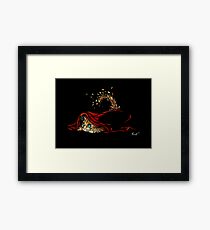 Kitten playing Framed Print