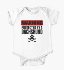 Warning Protected By A Dachshund One Piece - Short Sleeve