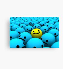 Yellow smiling emoji in a crowd of blue sad emojis Canvas Print