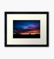 Colorful sunset with dramatic clouds Framed Print