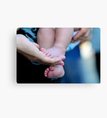 little feet of children Canvas Print