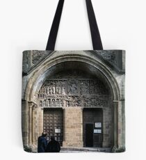 Tourists examining facade Conques Abbey Church St Foy 1040-1130 19840228 0037 Tote Bag