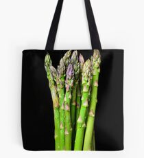Green asparagus on black Tote Bag