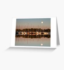 Reflecting sailboats sundown moon Greeting Card