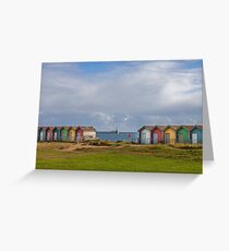 Beach huts with a view of Blyth Pier Greeting Card