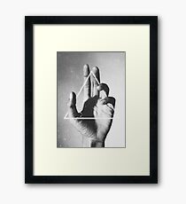 hand + triangle Framed Print
