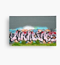 Abstract Graffiti on the textured brick wall Canvas Print