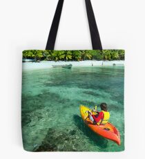 Kayaker on crystal clear tropical water Tote Bag