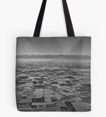 a continent divided Tote Bag