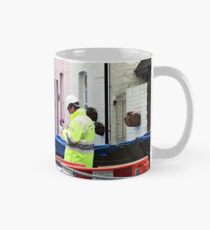 The Front of the Homes with the River at the Back Mug