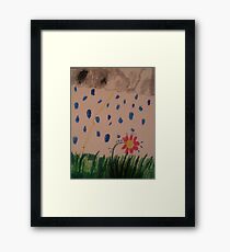 flower in the rain Framed Print